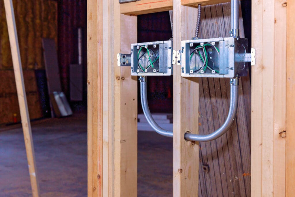 Wall electric wire cable electrical metal box interior under construction to new house